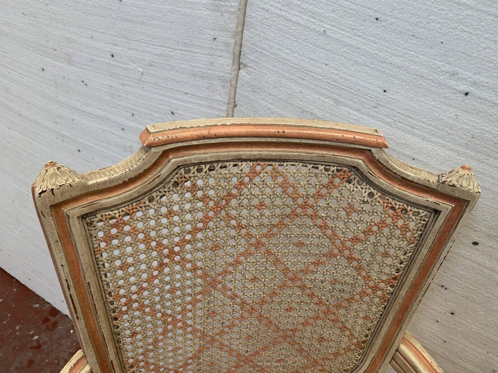 Pair of Louis XVI style armchairs in 20th century patinated beech