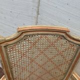 Pair of Louis XVI style armchairs in 20th century patinated beech
