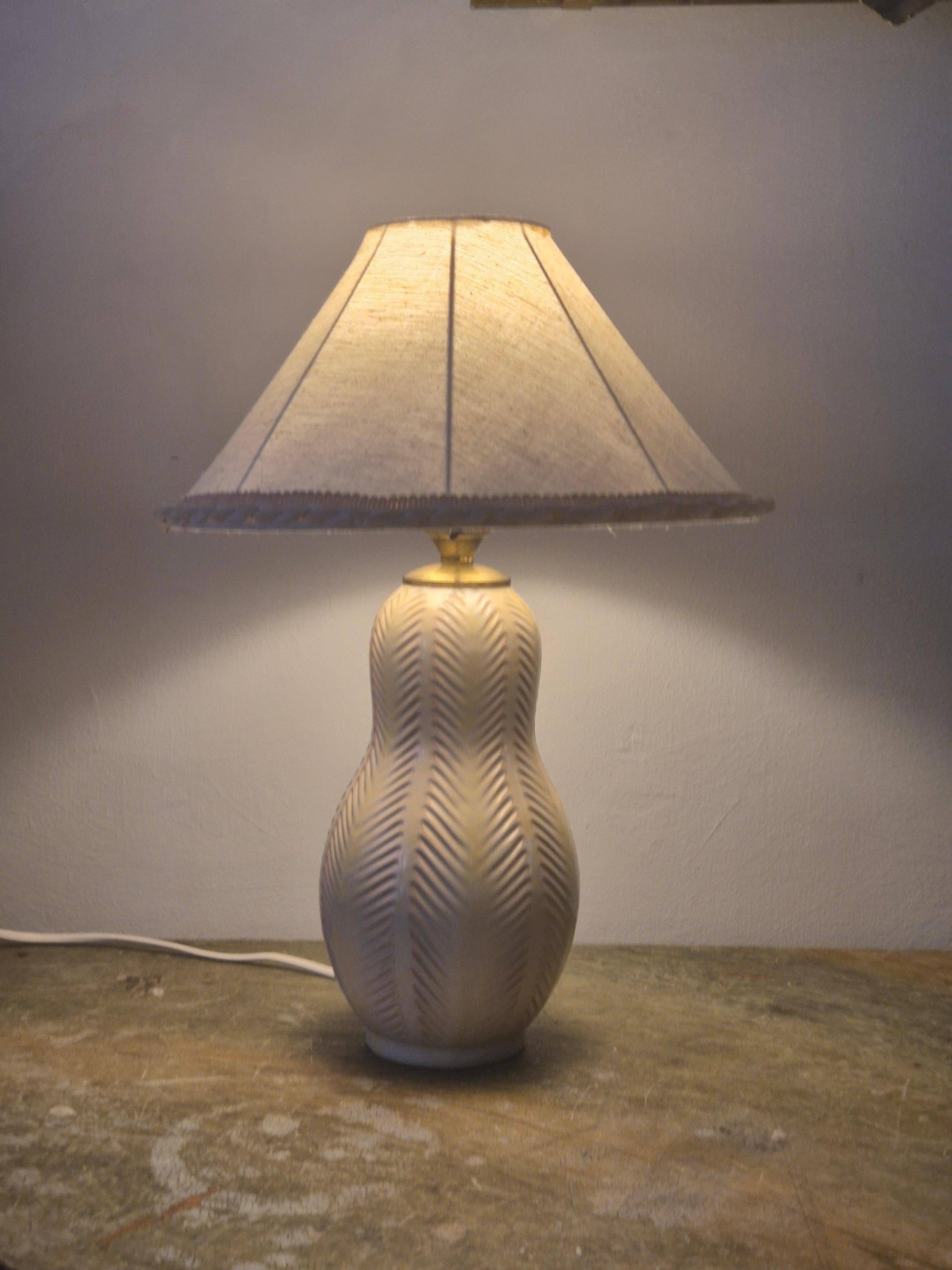 Modern Swedish table lamp with a ceramic base by Anna-Lisa Thomson, mid-1900s.