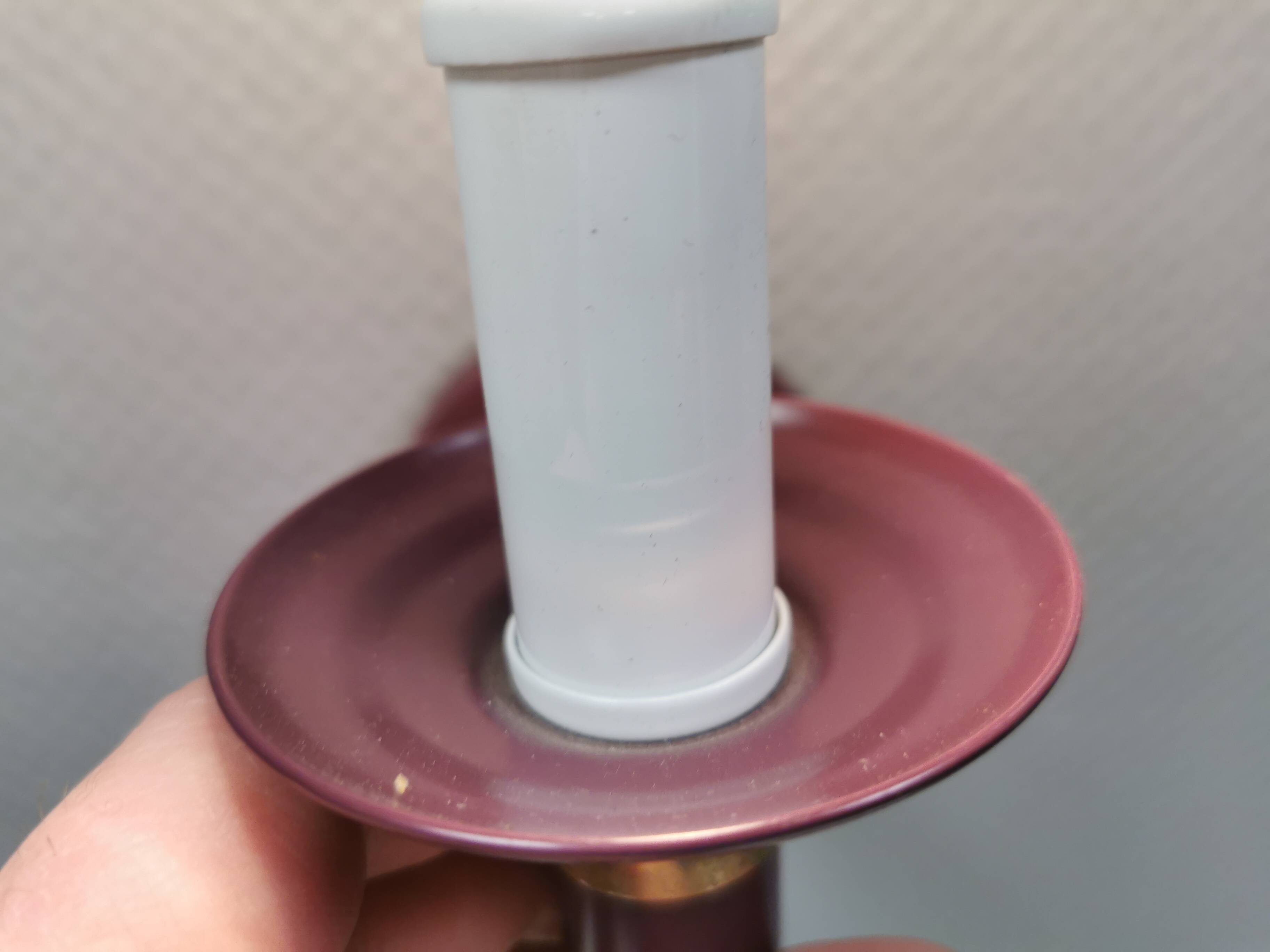 Wall lamp from Swedish Belid 1990s, in a beautiful aubergine purple colour.