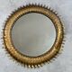 Round sun mirror in wrought iron from the 1950s Italy.