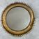 Round sun mirror in wrought iron from the 1950s Italy.