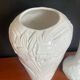 A pair of vintage vases in glazed porcelain.
