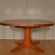 Oval walnut table with extension cords
