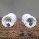 Pair of wall lights from the 1950s in porcelain.