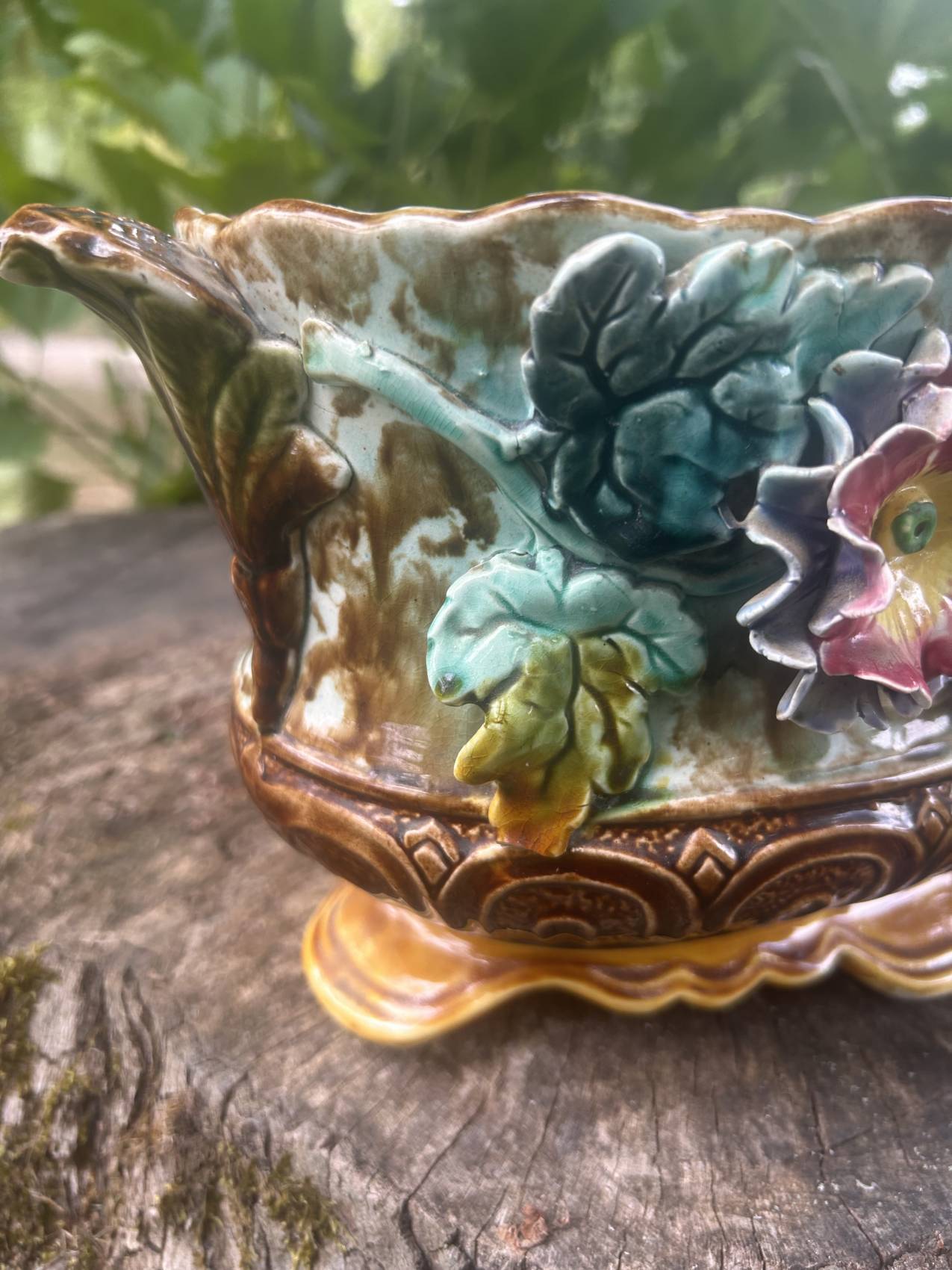 Antique jardinière in barbotine attributed to Onnaing with a floral motif.