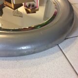 Vintage bright round bathroom mirror in metal