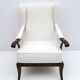 Fauteuil Paolo Buffa style moderne du milieu du siècle, en noyer italien et revêtement bouclé