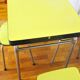 Formica table with 4 chairs and a stool dating from the 60s and 70s