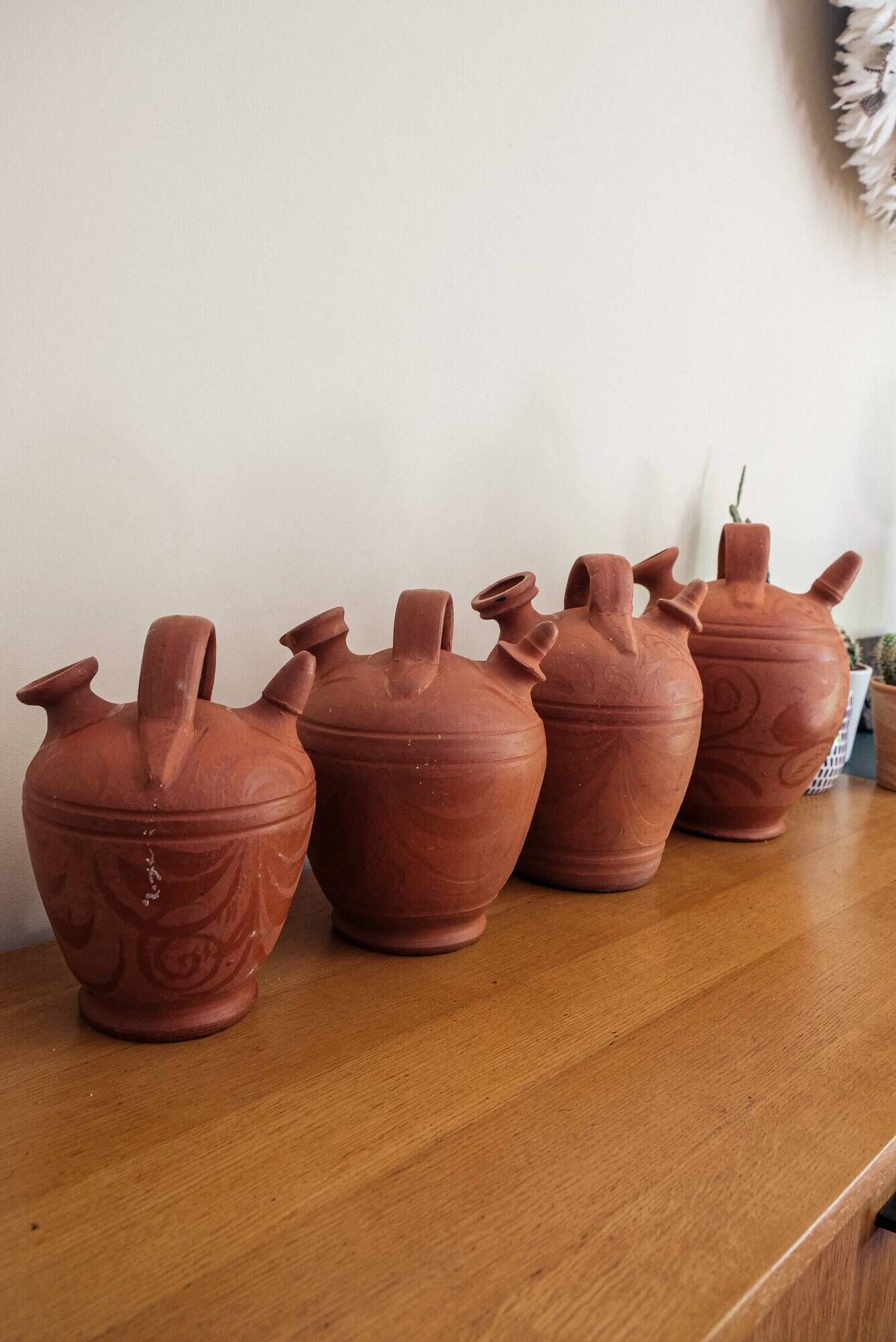 Set of 4 terracotta jugs