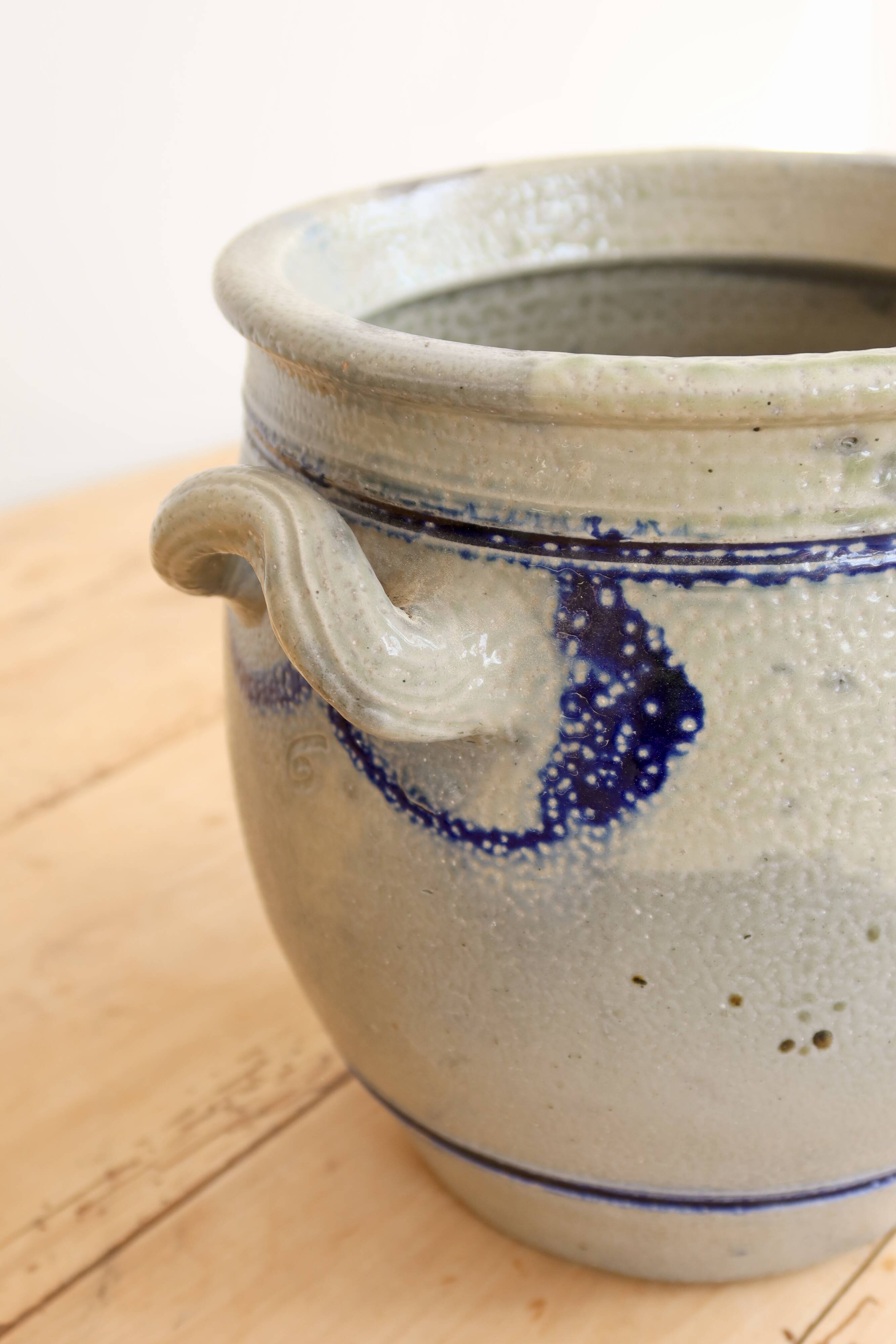 Old ceramic jar from Alsace with blue decoration.