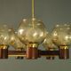 Scandinavian chandelier in mahogany wood and brass