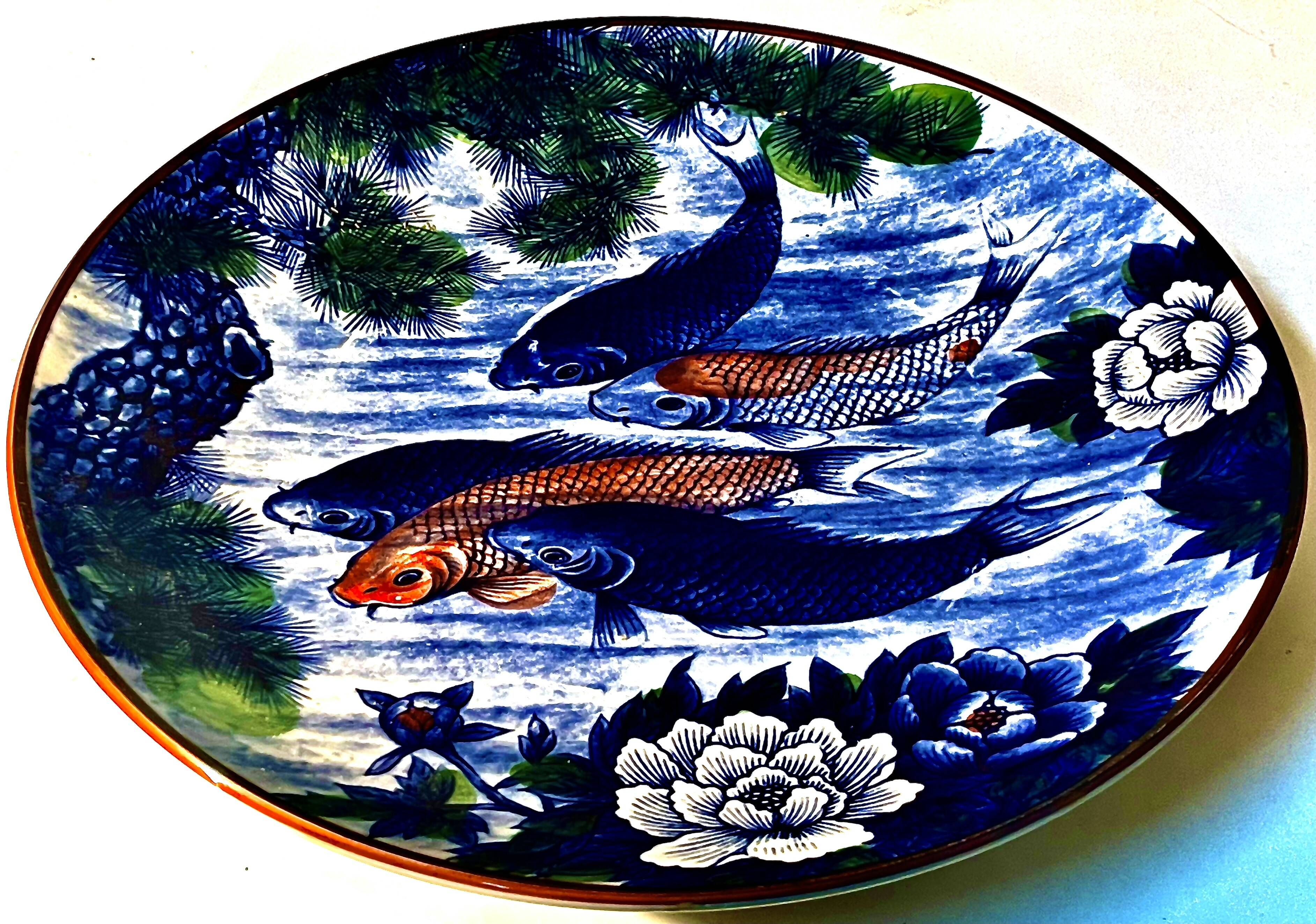 Decorative porcelain plate featuring a koi carp.