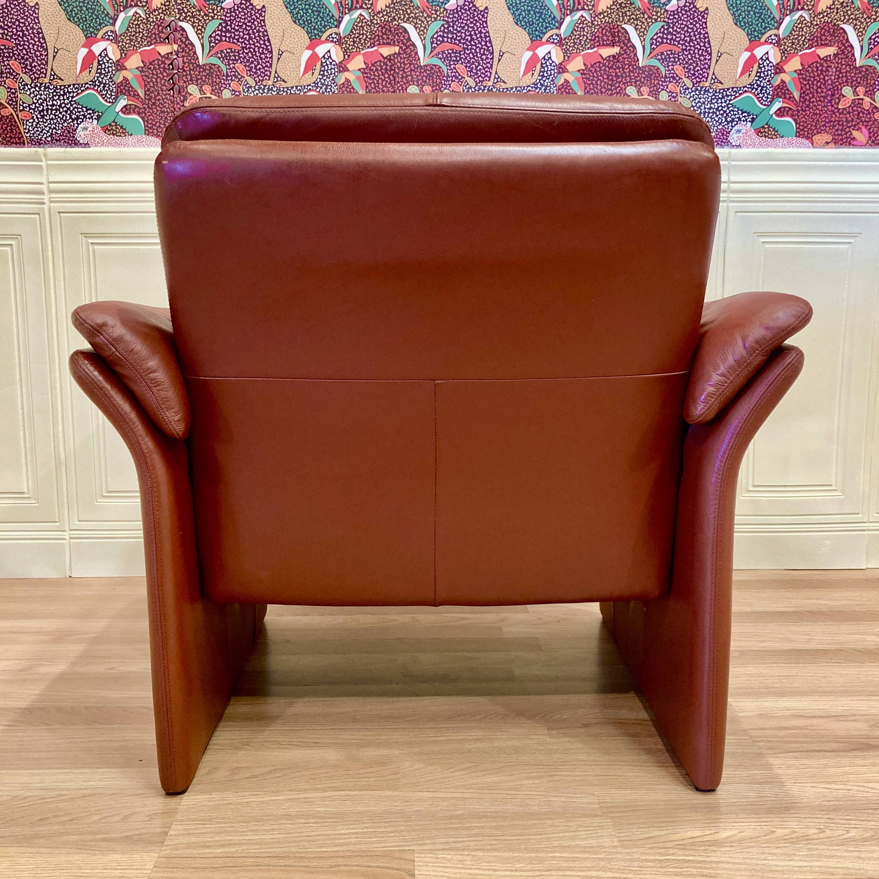Pair of "Erpo" designer adjustable leather armchairs.