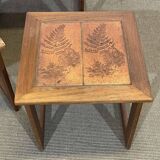 Set of 3 nesting tables in teak with tiled tops.