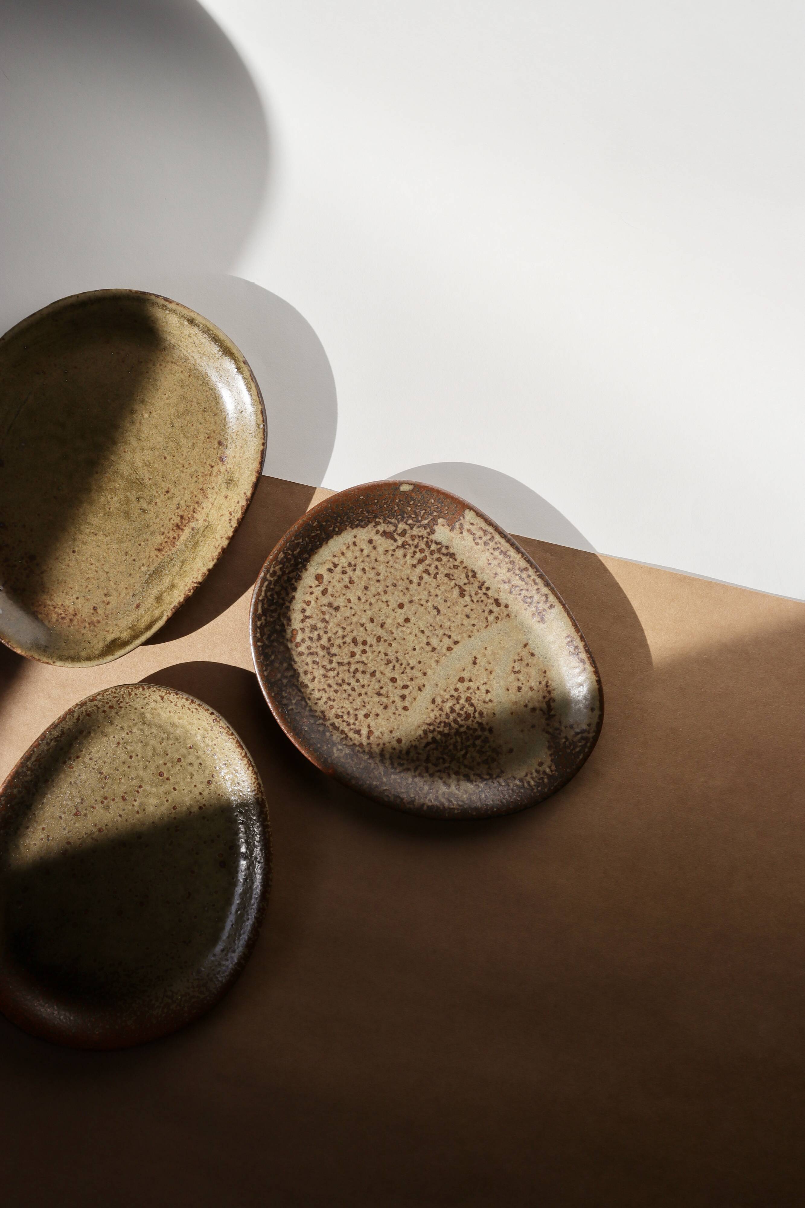 Trio of stoneware plates