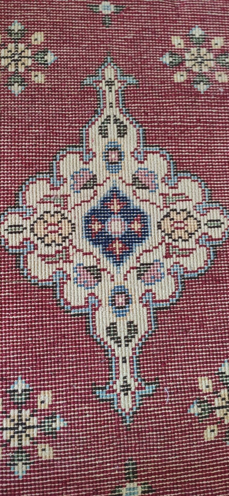 Small Persian rug from the 1960s.