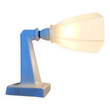 Antique wall light in porcelain with a new socket.