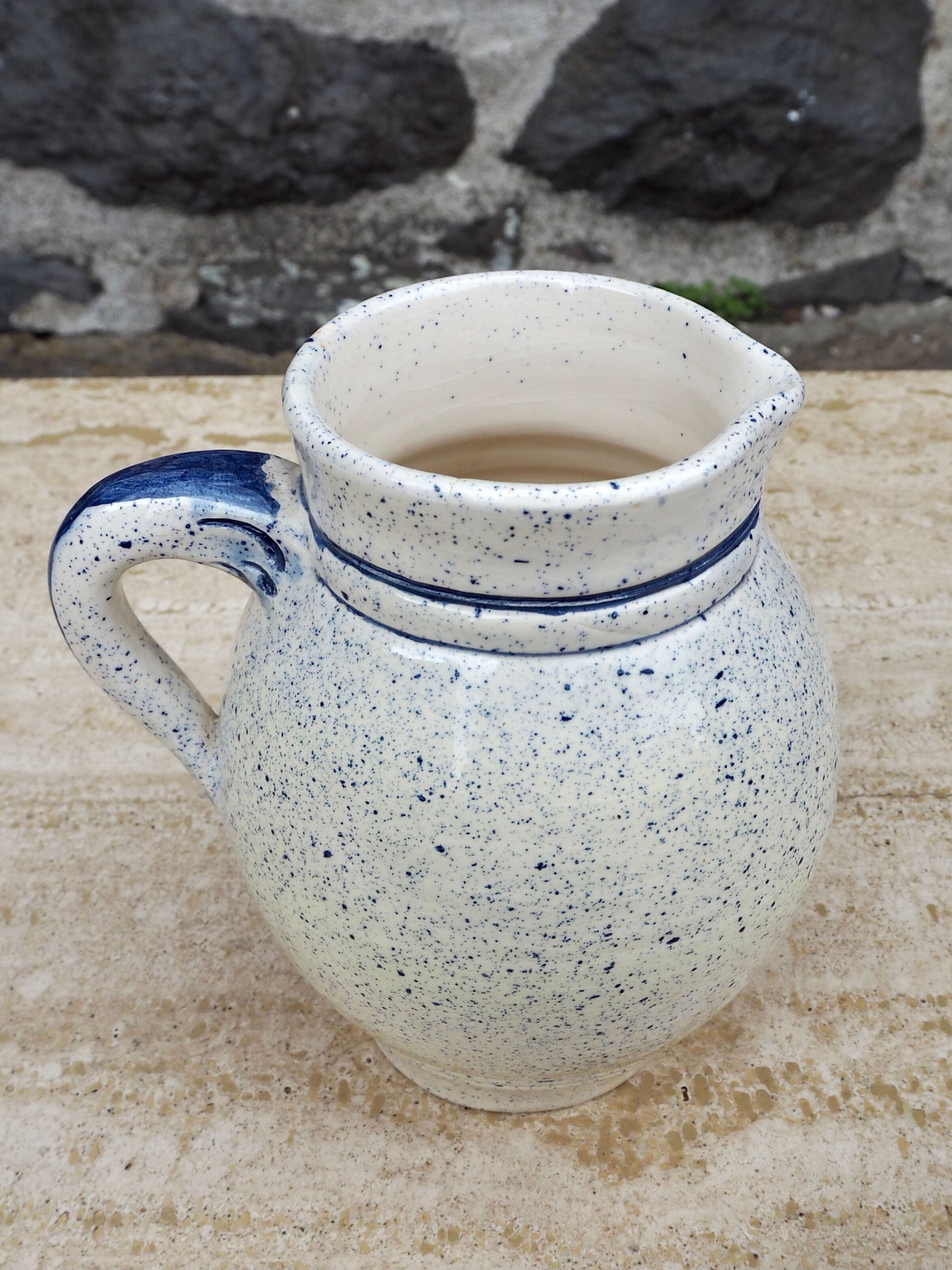 Speckled ceramic pitcher