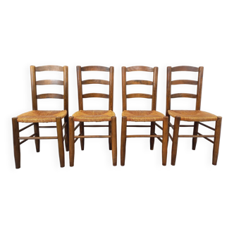 Suite de 4 chaises brutalistes vintage en bois et paille des années 60