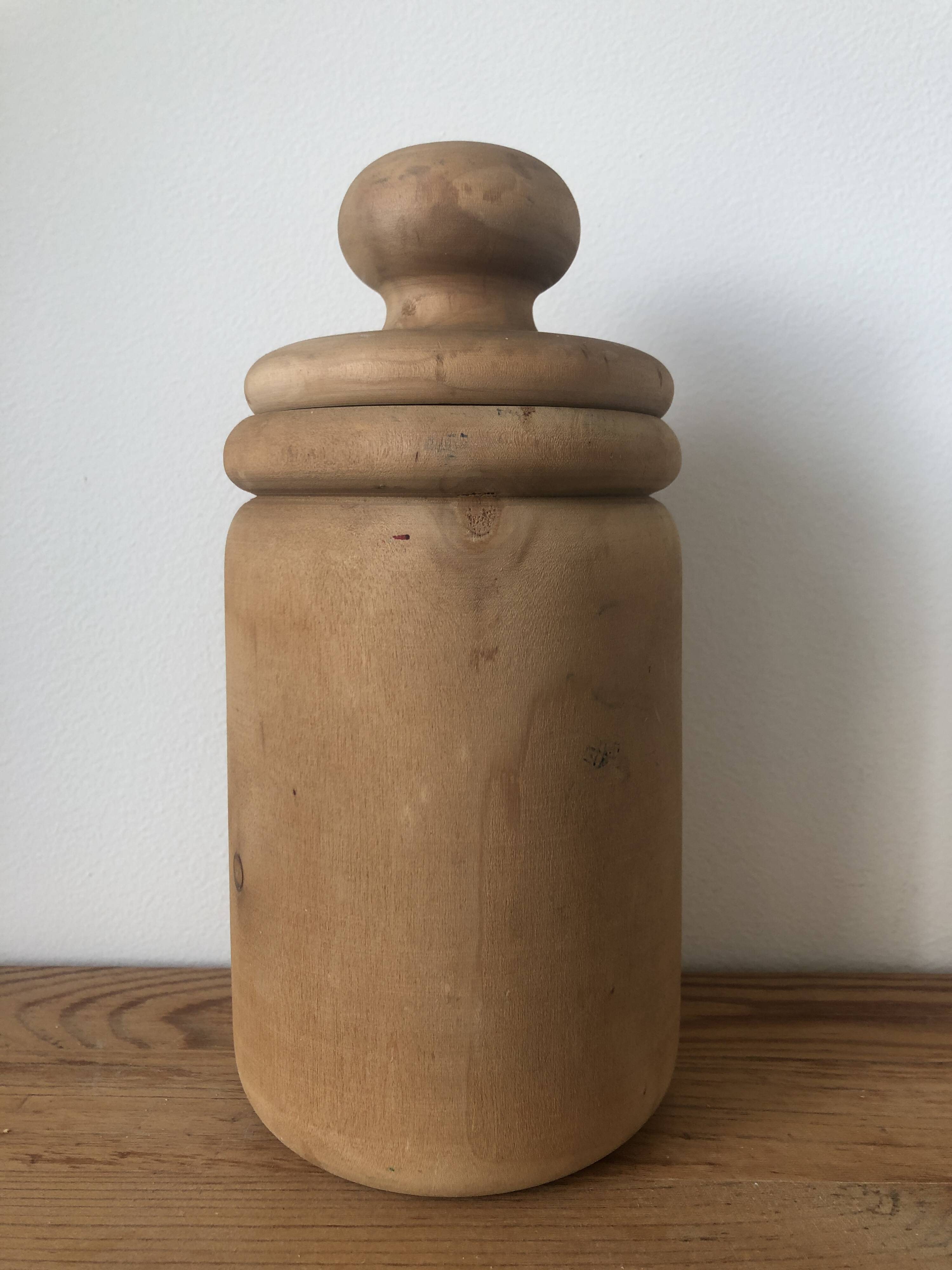 large pot with turned wooden lid