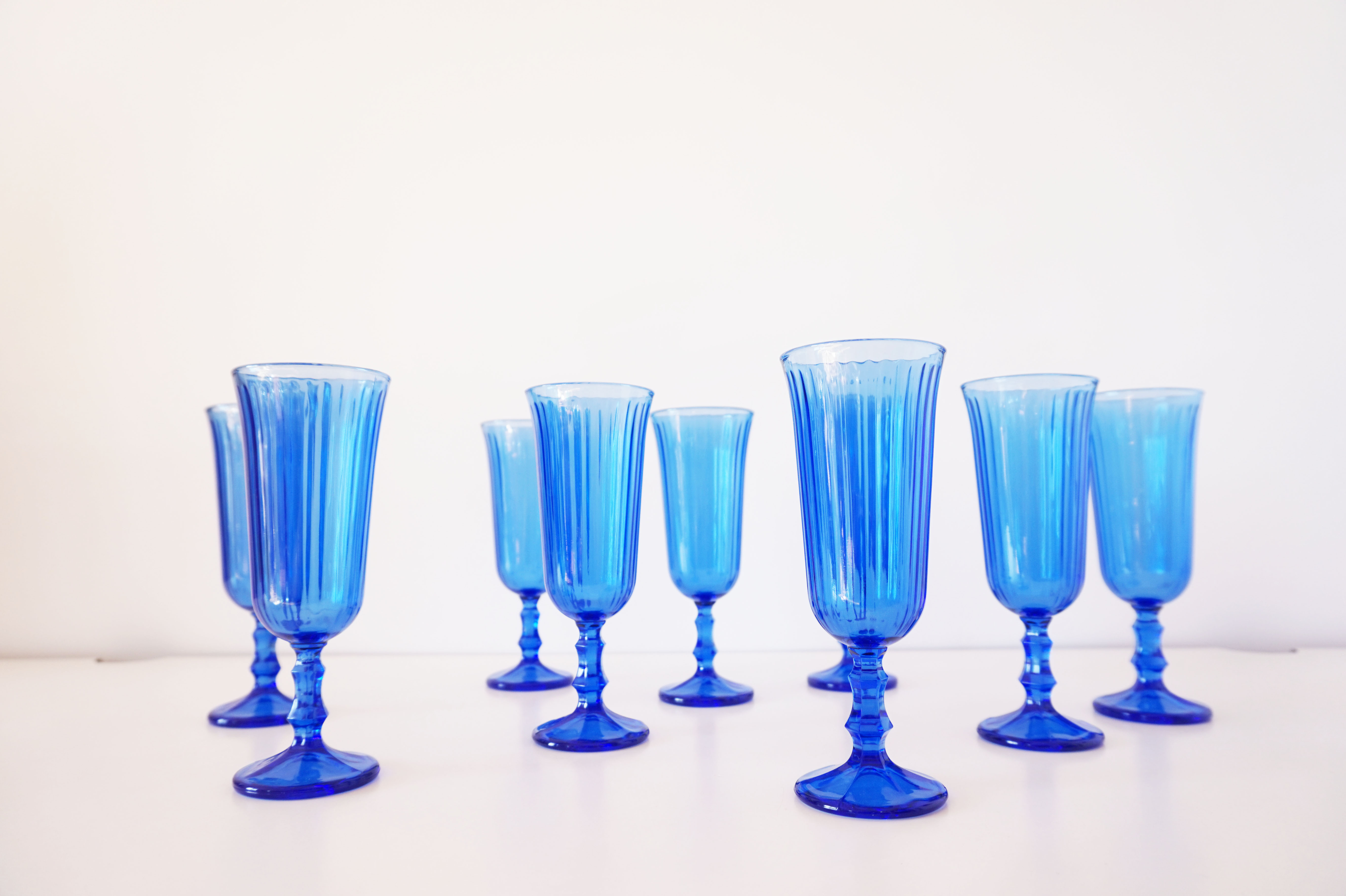 Set of 9 blue champagne flutes