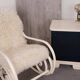 Antique Thonet rocking chair in ivory lacquered bent wood, with a white lamb fur seat.