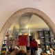 Large old oval mirror with beige patina wooden frame early 20th century