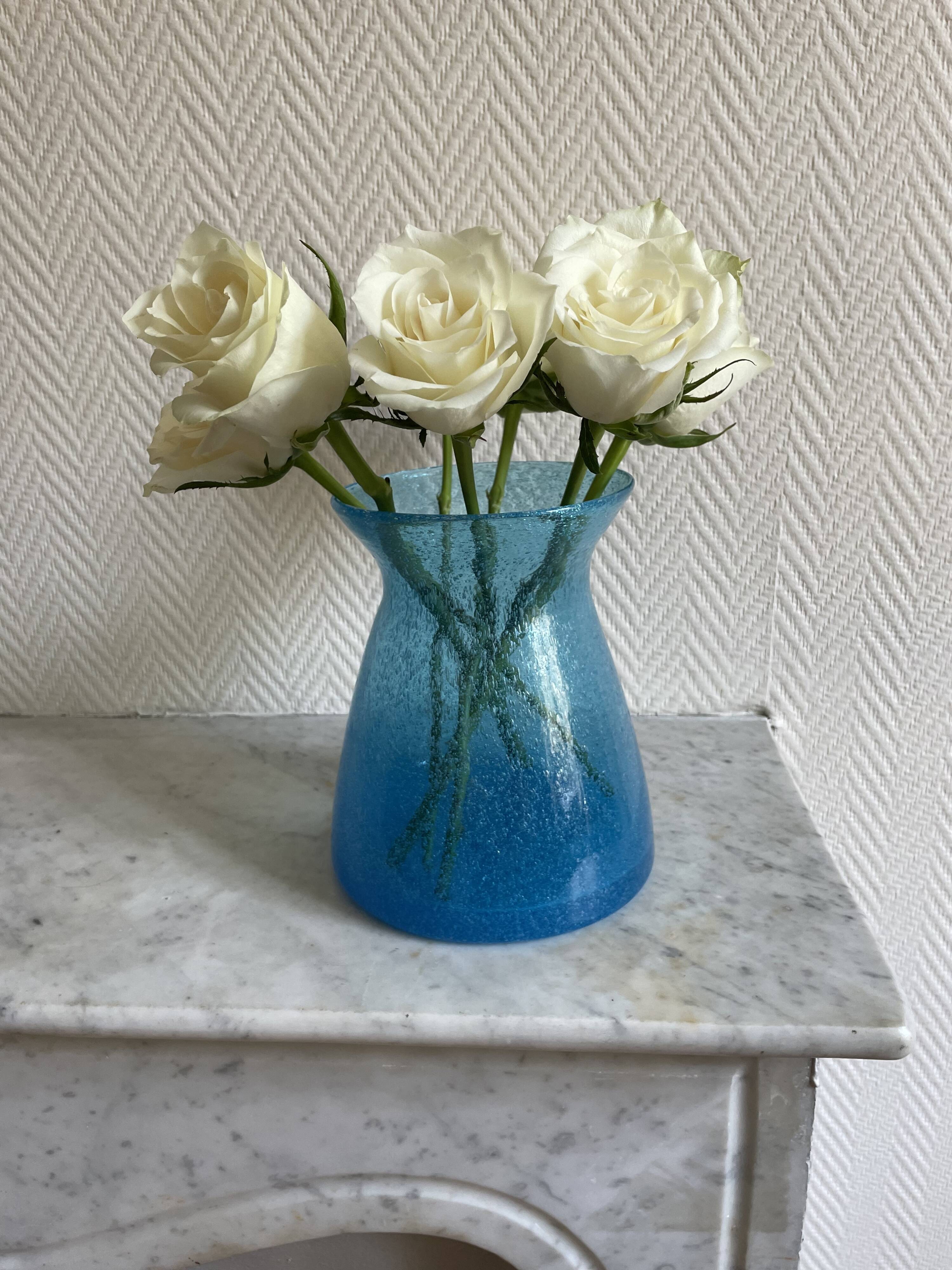 Blue glass vase with encrusted bubbles