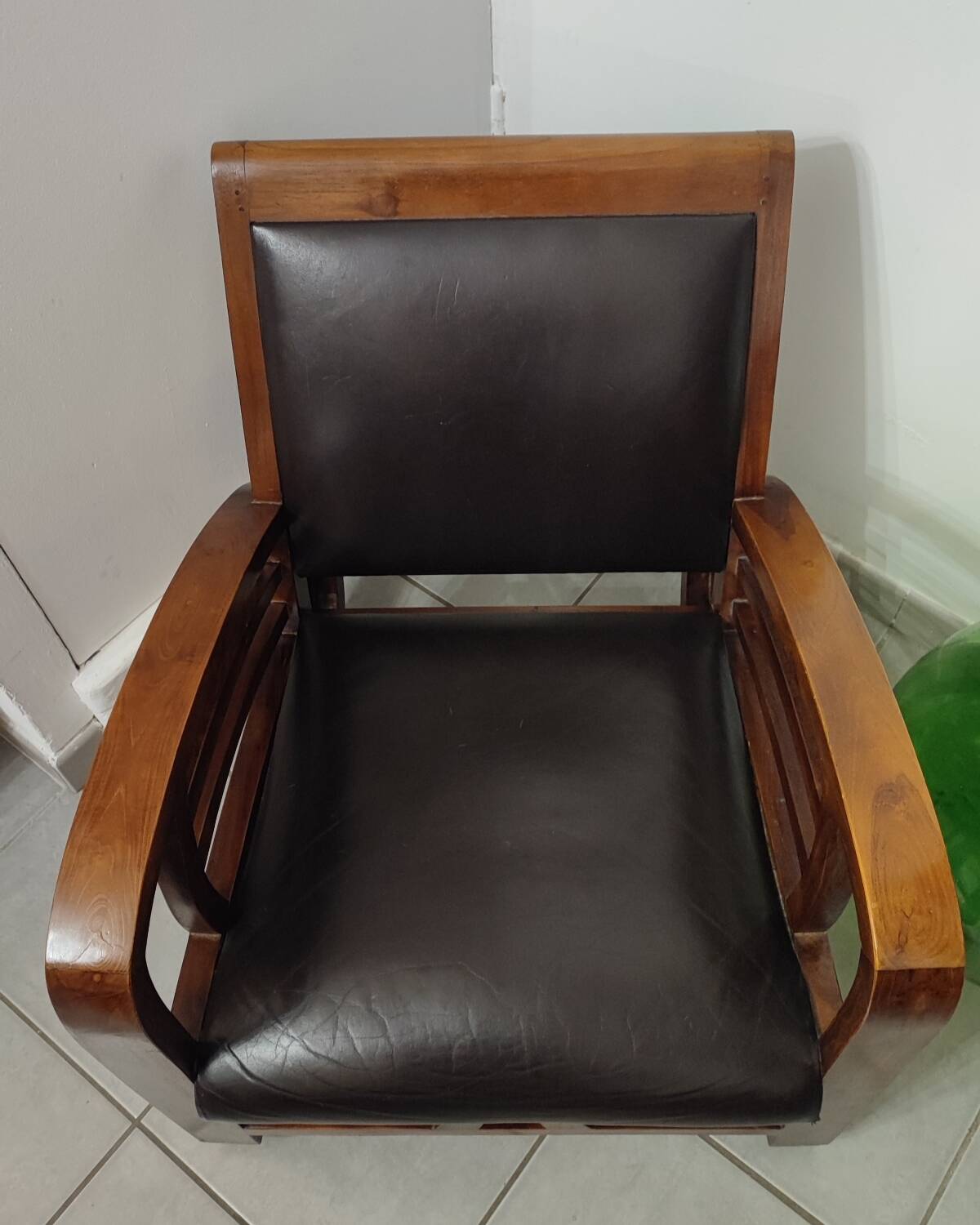 Leather and teak armchair