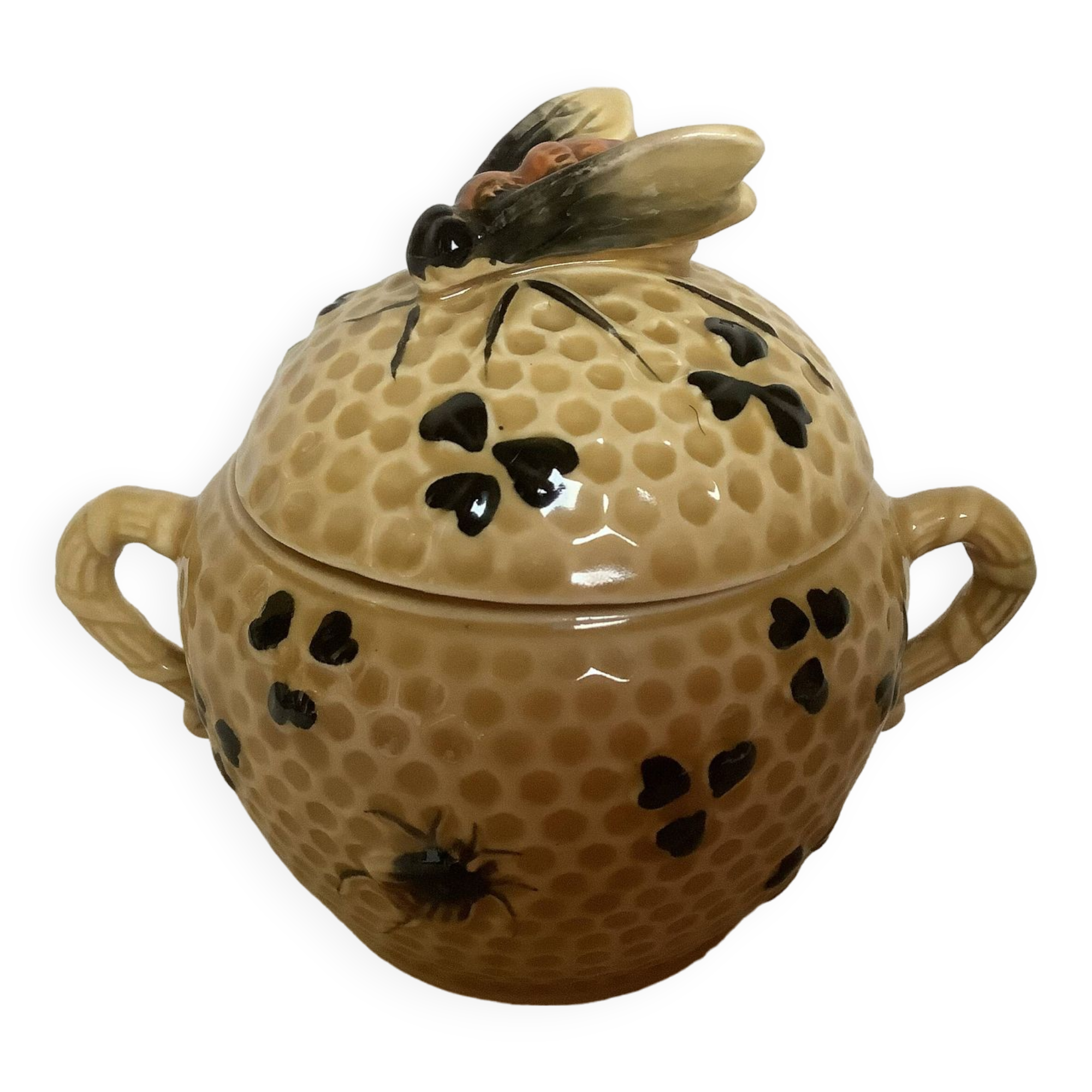 Old honey pot with bee decoration