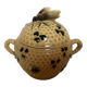 Old honey pot with bee decoration