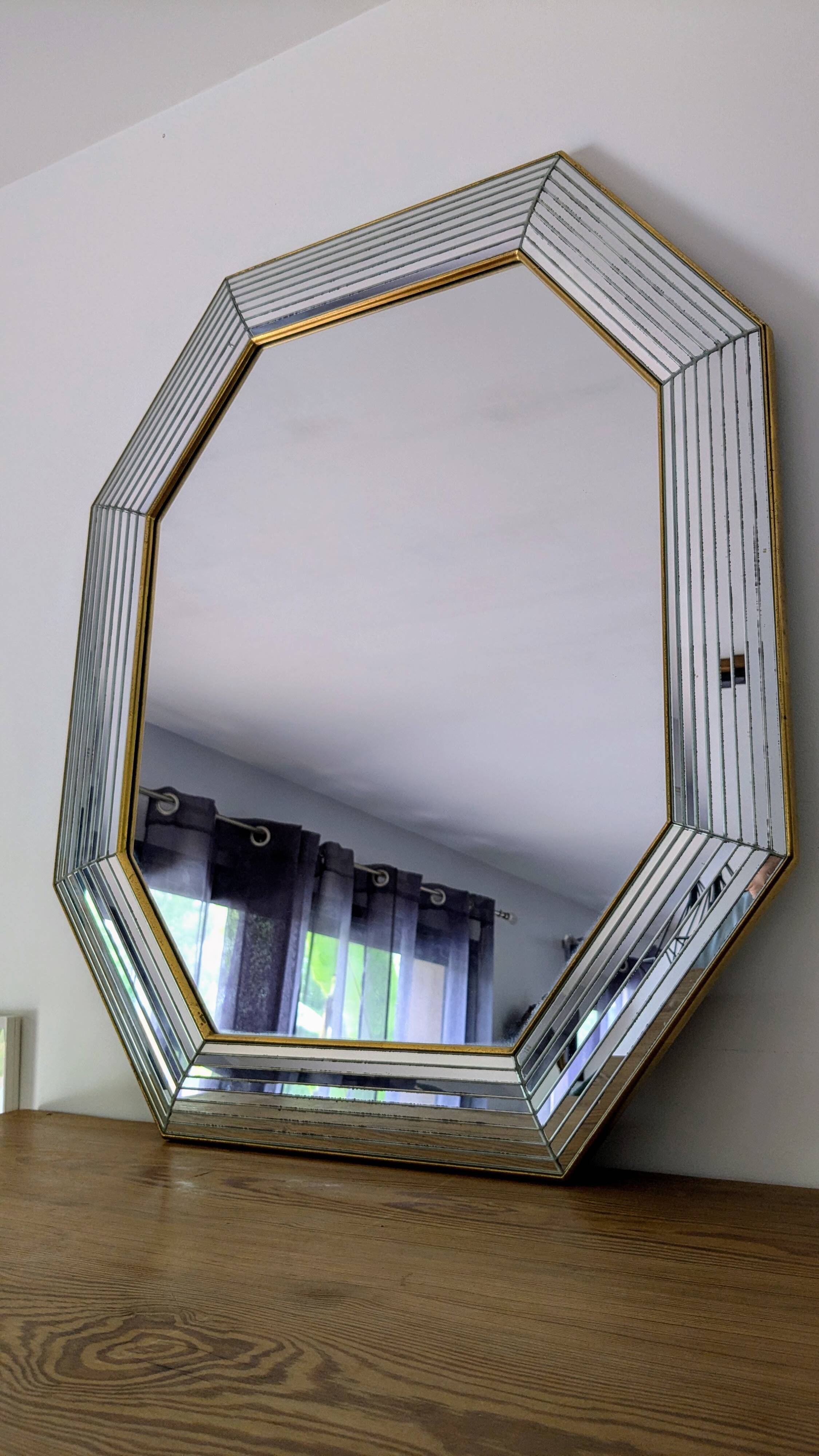 Octagonal mirror with brass parcloses by Jan Deknudt