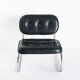 Vintage low armchair. Chrome metal and eskai - Spain, 1970s