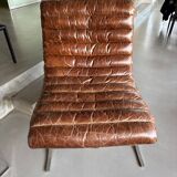 Pair of brown leather armchairs