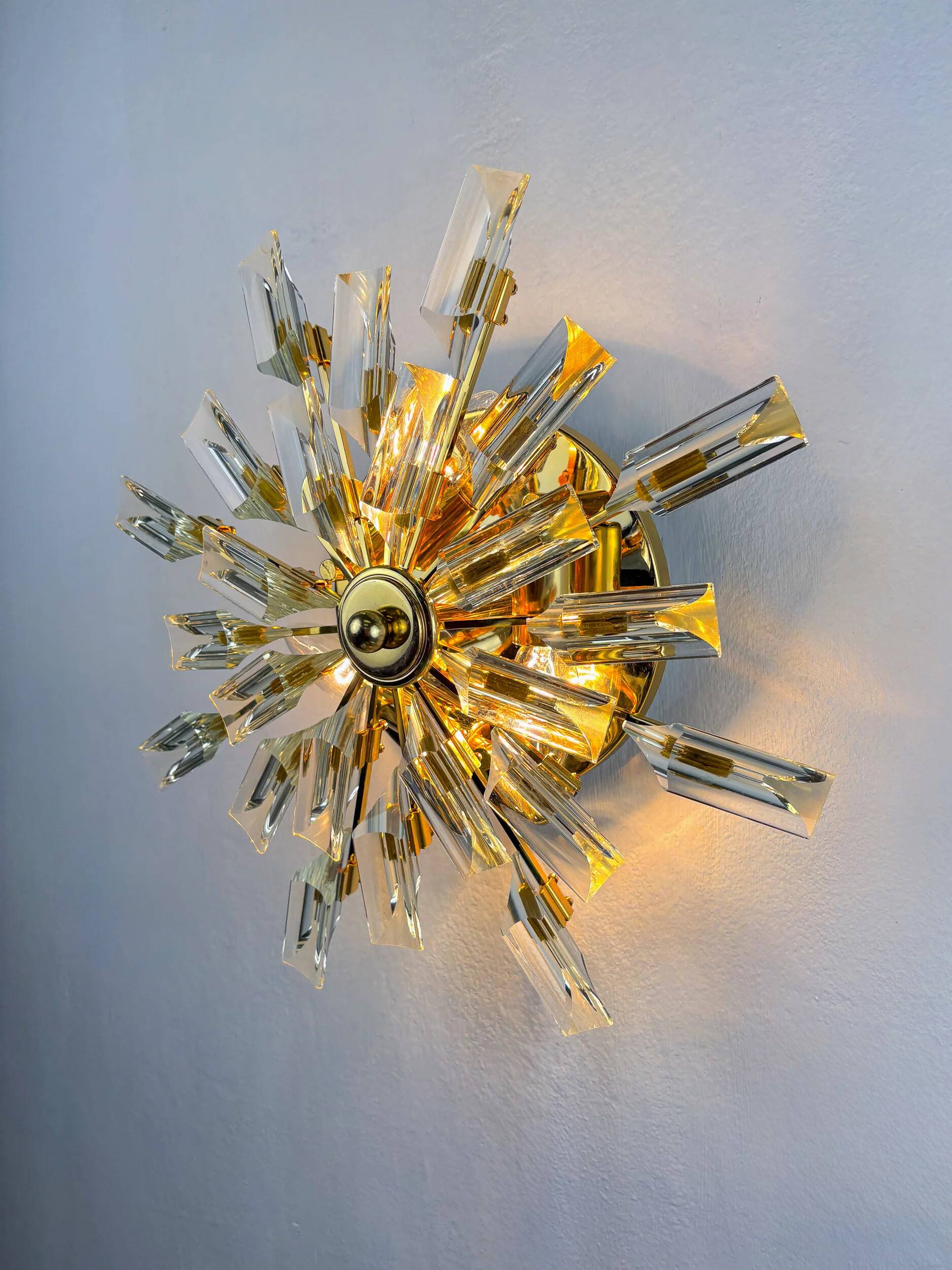 Sun-shaped ceiling or wall light by Oscar Torlasco for StilKronen, cut Murano glass, Italy, 1970s