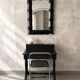 Rectangular mirror in patinated black wood resembling bamboo – 68 × 100 cm