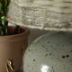 Vintage ceramic lamp with a wool shade.