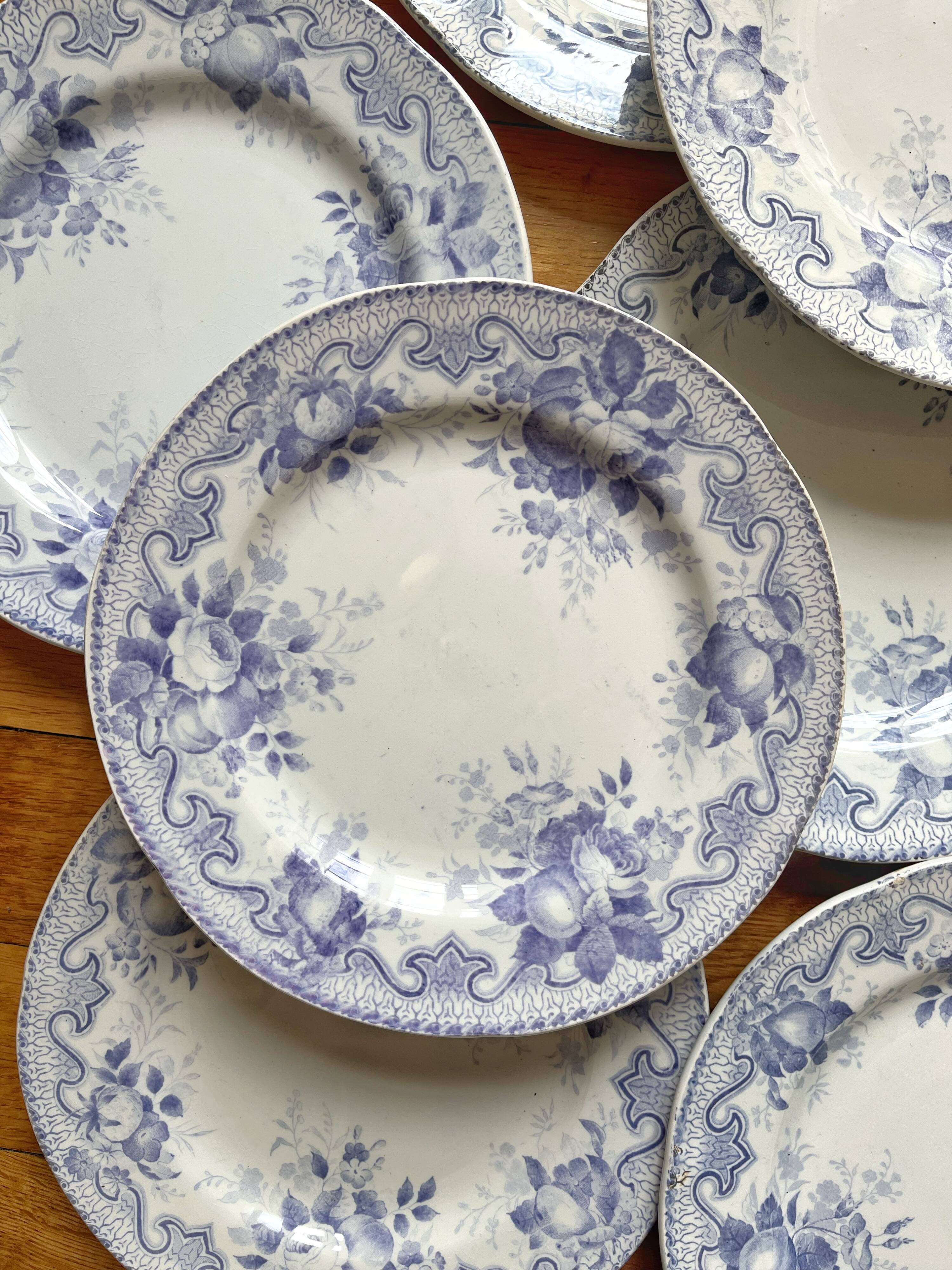 8 flat ironware plates Bouquets, Creil and Montereau late 19th century