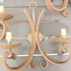 Four antique wrought iron wall lights