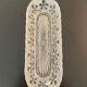 1 Elongated molded glass cup