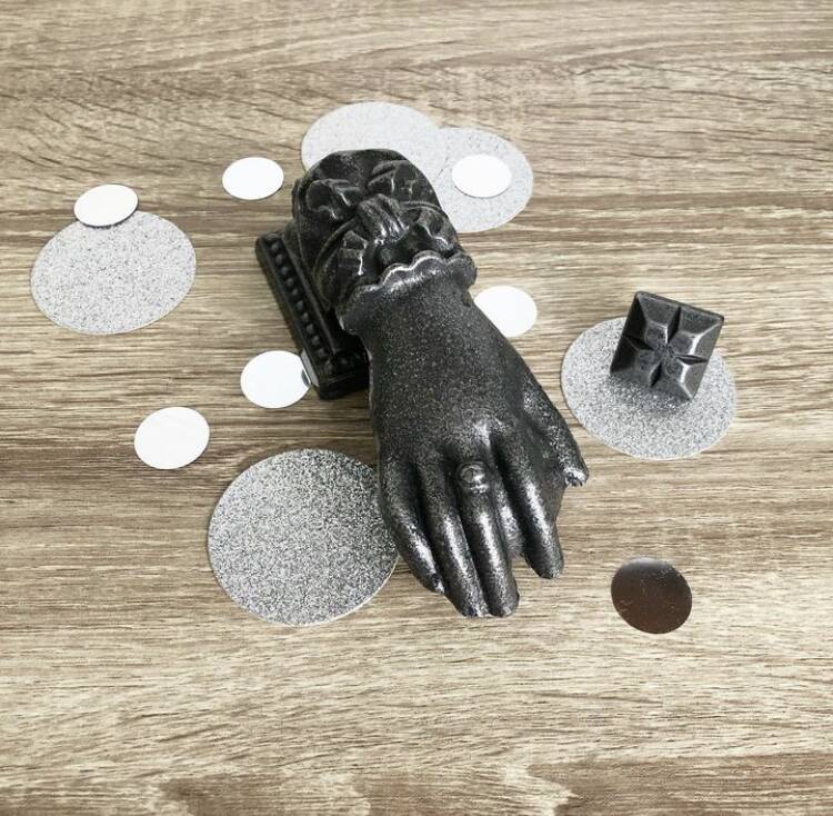 Vintage hand door knocker