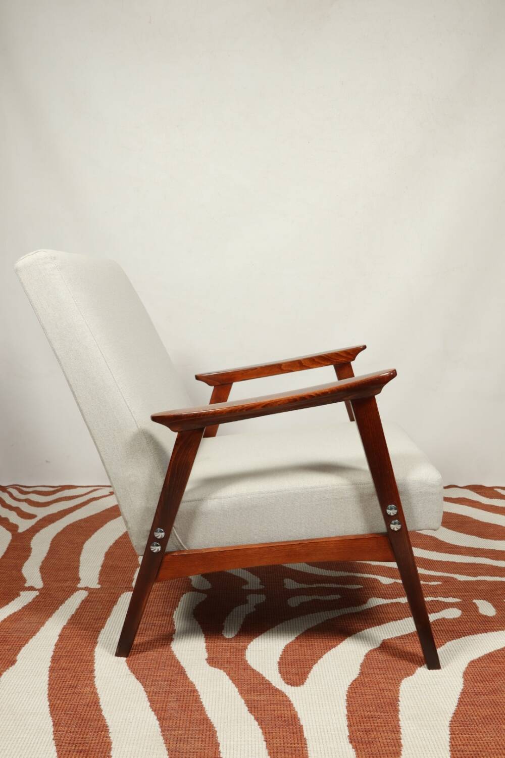 Vintage light gray armchair dark wood Scandinavian design 1970
