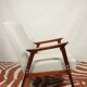 Vintage light gray armchair dark wood Scandinavian design 1970