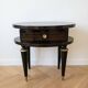 Art Deco bedside table in black wood with gold details.