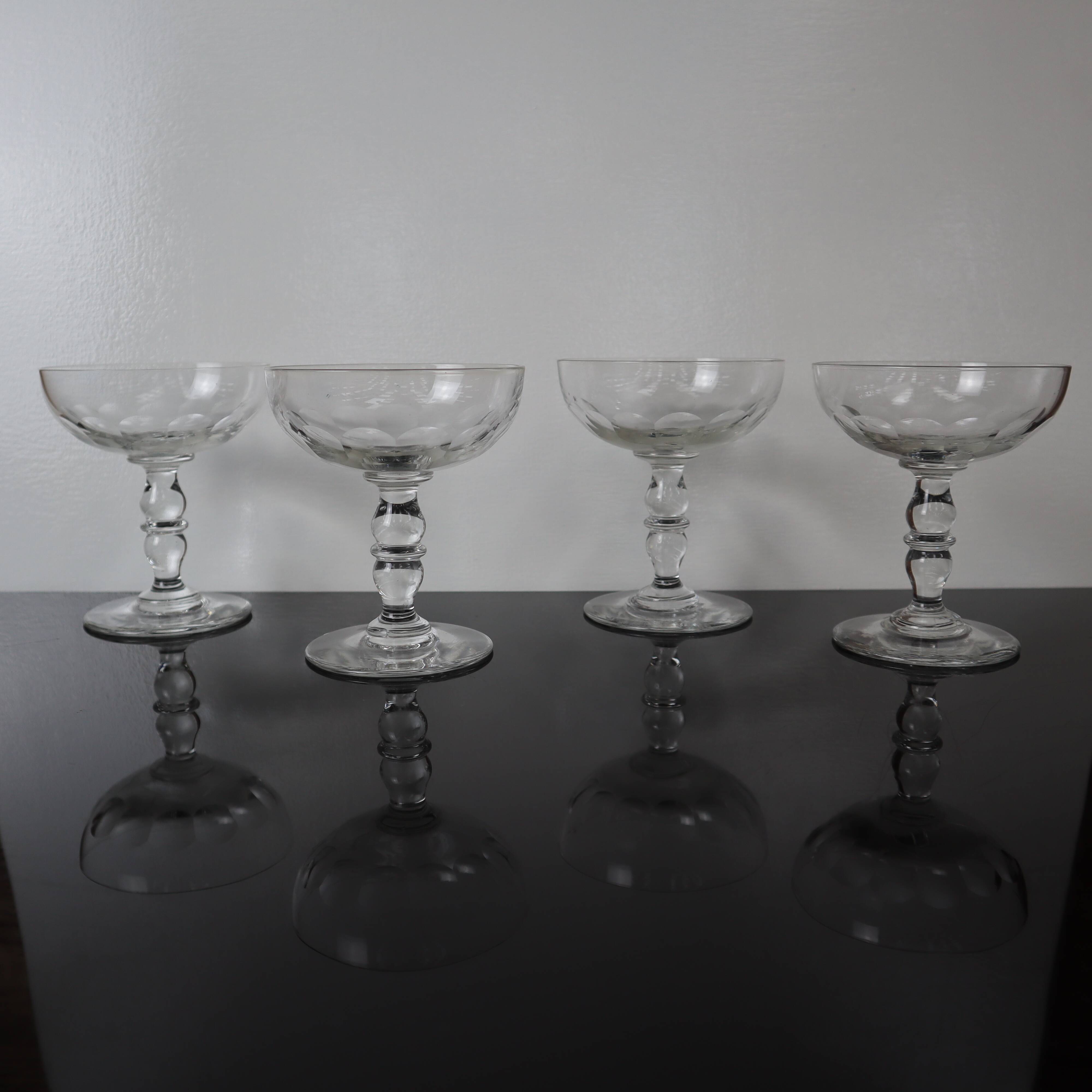 4 superb 20th century blown glass champagne glasses