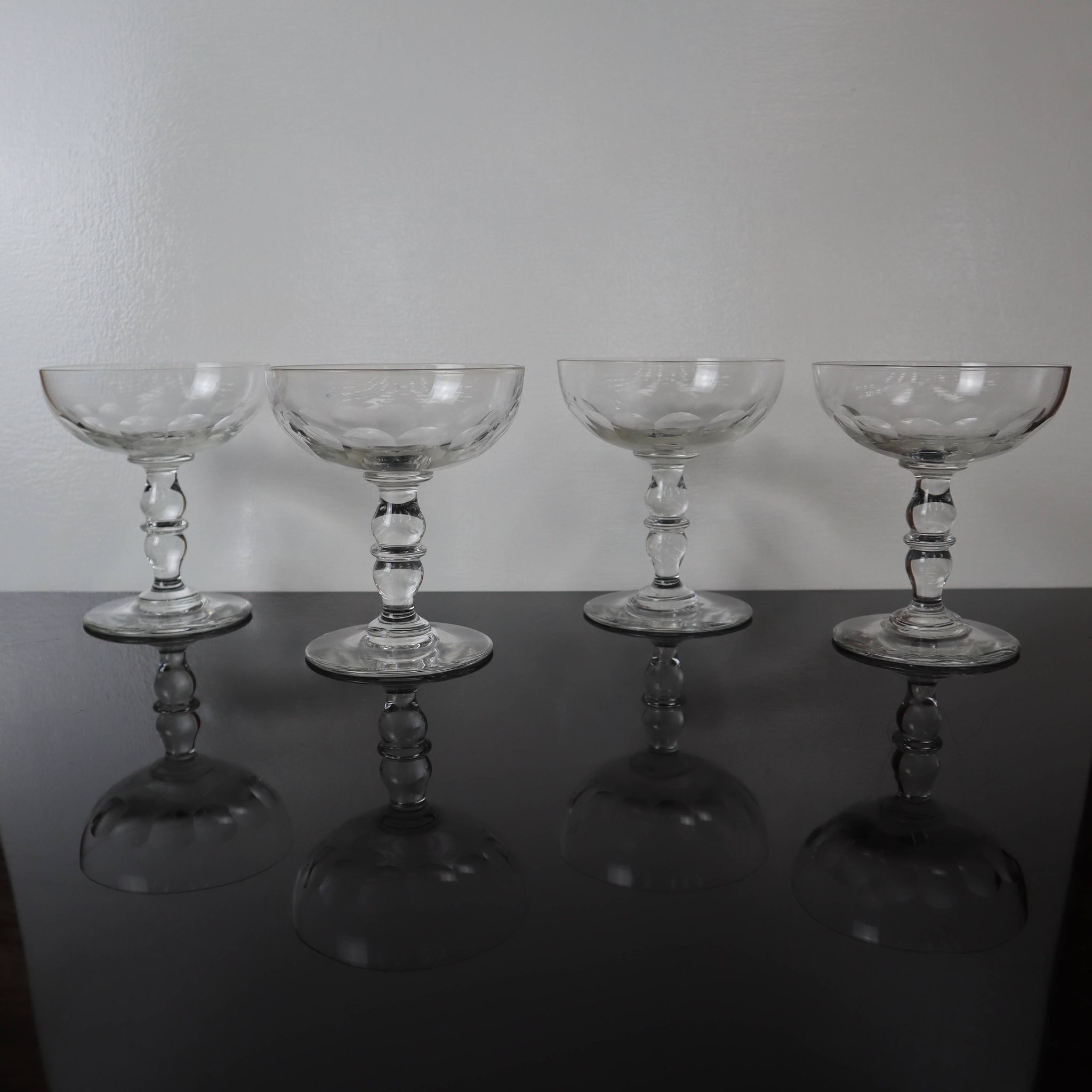 4 superb 20th century blown glass champagne glasses