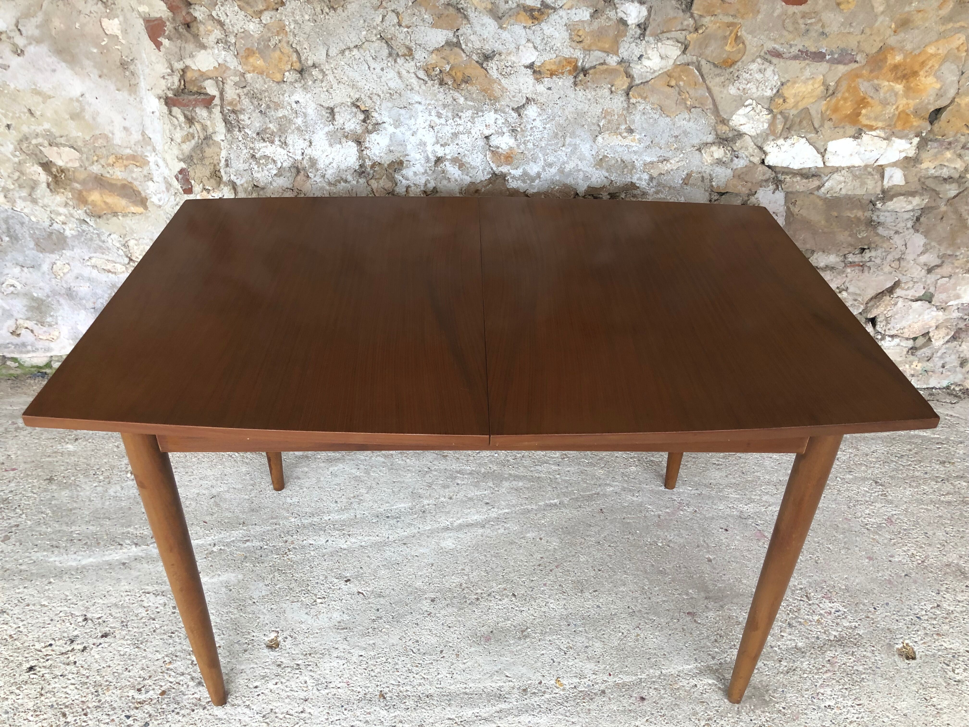 Scandinavian extension teak stretch table in butterfly ephardt by Meredew circa 60's