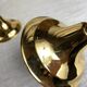 Pair of silver and gold metal candlesticks