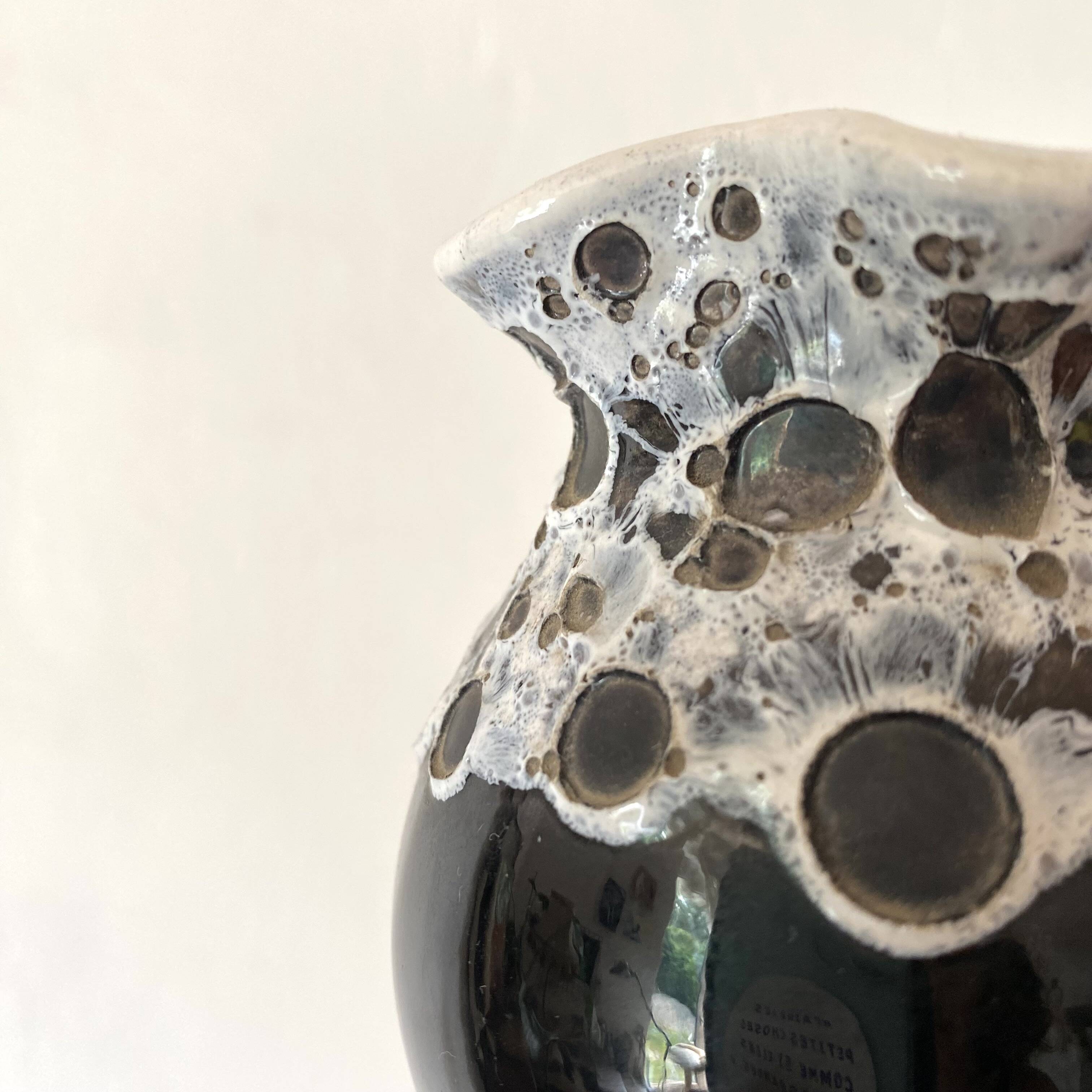 Vintage black and white Savoyard enamel vase